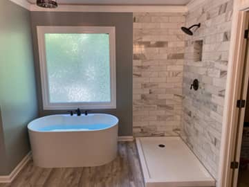 Faucet and sink installation for bathroom remodeling.